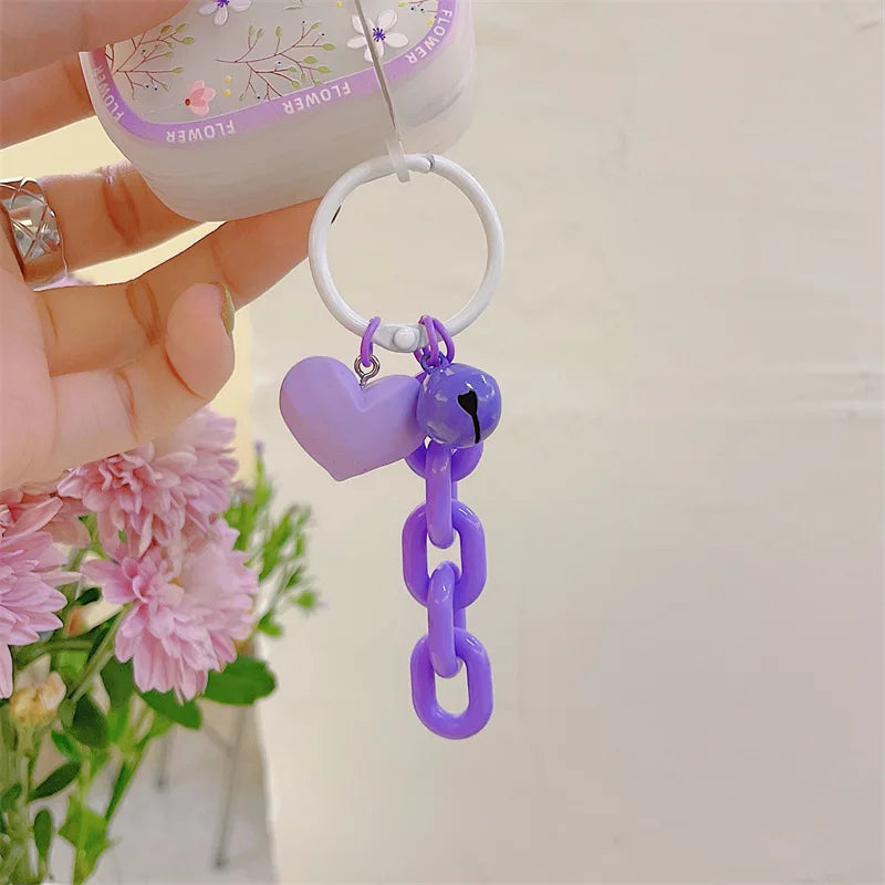 Lila florale AirPods-Hülle + LoveHeart-Anhänger